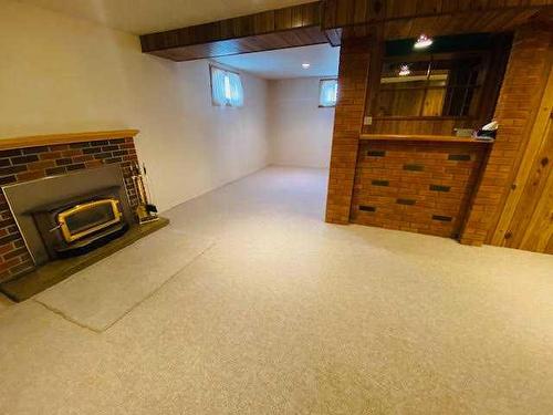 120 Chetamon Drive, Hinton, AB - Indoor With Fireplace