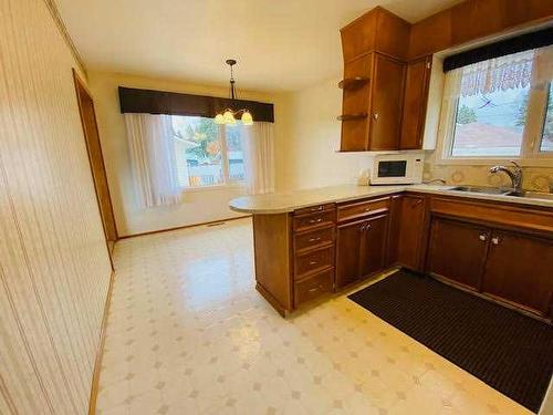 120 Chetamon Drive, Hinton, AB - Indoor Photo Showing Kitchen With Double Sink