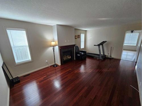 1-4034 18 Avenue, Edson, AB - Indoor With Fireplace