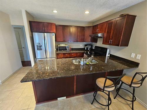 1-4034 18 Avenue, Edson, AB - Indoor Photo Showing Kitchen With Double Sink