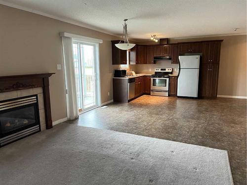 104-502 1 Street, Fox Creek, AB - Indoor With Fireplace