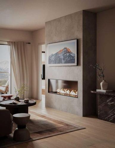 201-1717 Bow Valley Trail, Canmore, AB - Indoor Photo Showing Living Room With Fireplace