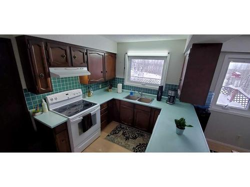 14132 East Bank Road, Rural Yellowhead County, AB - Indoor Photo Showing Kitchen With Double Sink