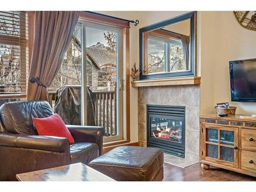 102-107 Montane Road, Canmore, AB - Indoor Photo Showing Living Room With Fireplace