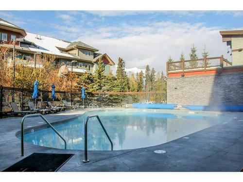 102-107 Montane Road, Canmore, AB - Outdoor With In Ground Pool