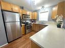 3-5010 41 Avenue, Athabasca, AB  - Indoor Photo Showing Kitchen With Double Sink 