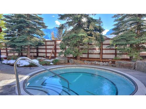 117-1818 Mountain Avenue, Canmore, AB - Outdoor With In Ground Pool