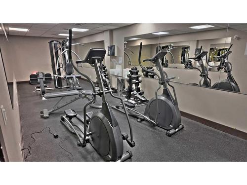 117-1818 Mountain Avenue, Canmore, AB - Indoor Photo Showing Gym Room