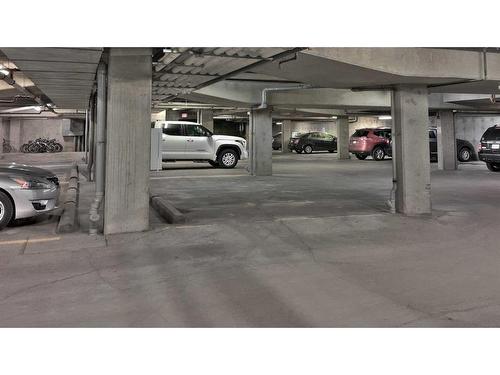 117-1818 Mountain Avenue, Canmore, AB - Indoor Photo Showing Garage