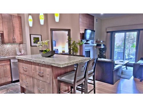 117-1818 Mountain Avenue, Canmore, AB - Indoor Photo Showing Kitchen