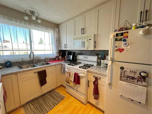 104A Cheviot Drive, Hinton, AB - Indoor Photo Showing Kitchen With Double Sink