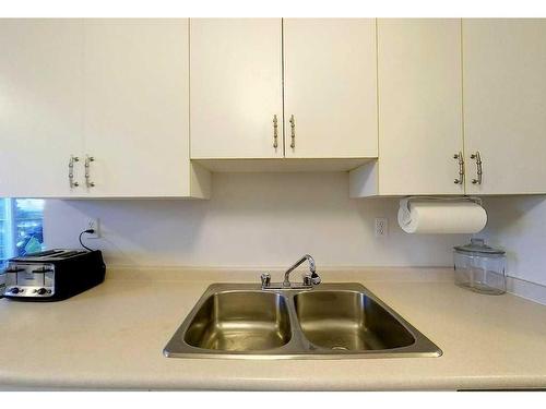 206A-5611 10Th Avenue, Edson, AB - Indoor Photo Showing Kitchen With Double Sink