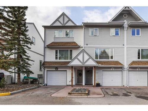 516-1080B Cougar Creek Drive Se, Canmore, AB - Outdoor With Facade