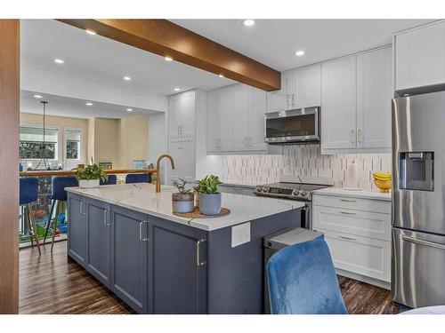 516-1080B Cougar Creek Drive Se, Canmore, AB - Indoor Photo Showing Kitchen With Upgraded Kitchen