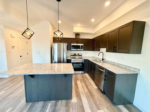 324A Boutin Avenue, Hinton, AB - Indoor Photo Showing Kitchen With Stainless Steel Kitchen With Upgraded Kitchen