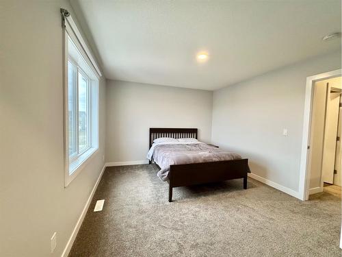 9511D 112 Street, Clairmont, AB - Indoor Photo Showing Bedroom