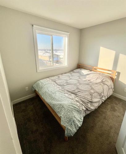 9511D 112 Street, Clairmont, AB - Indoor Photo Showing Bedroom