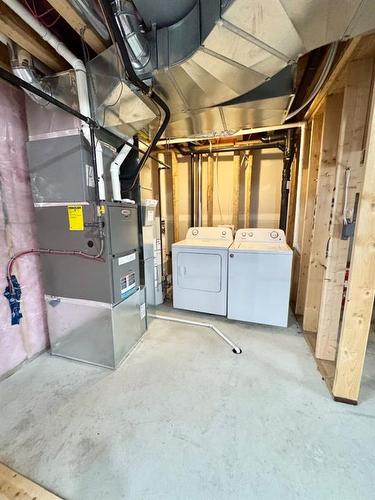 9511D 112 Street, Clairmont, AB - Indoor Photo Showing Laundry Room