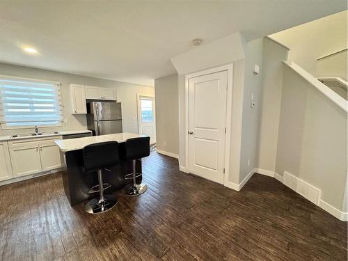 9511D 112 Street, Clairmont, AB - Indoor Photo Showing Kitchen With Double Sink