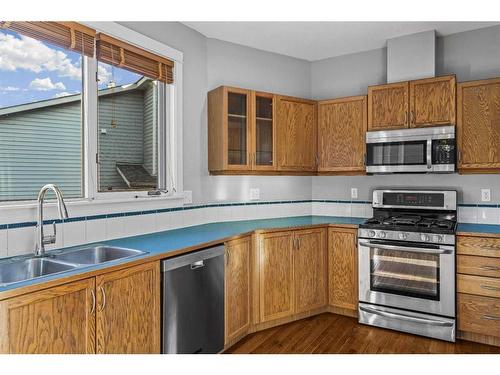 400-200 Rabbit Street, Banff, AB - Indoor Photo Showing Kitchen With Double Sink