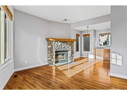 400-200 Rabbit Street, Banff, AB - Indoor Photo Showing Living Room With Fireplace