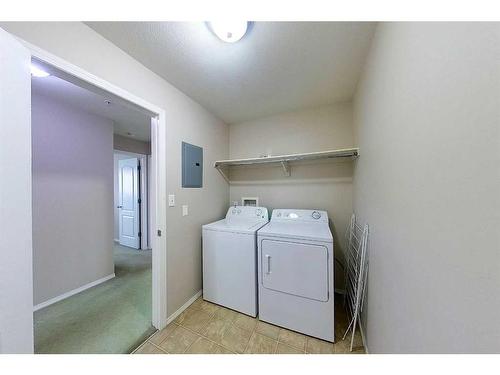 302-1615 41 Street, Edson, AB - Indoor Photo Showing Laundry Room