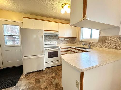 34 Windfall Drive, Whitecourt, AB - Indoor Photo Showing Kitchen With Double Sink