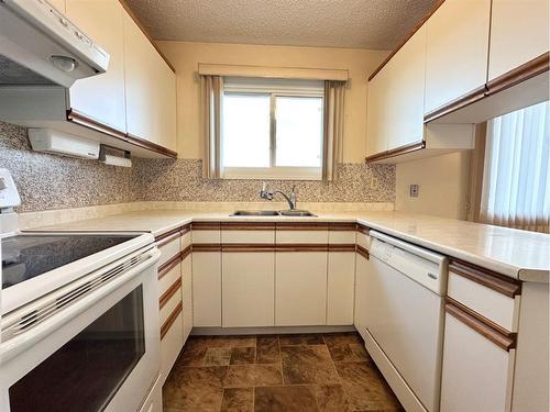 34 Windfall Drive, Whitecourt, AB - Indoor Photo Showing Kitchen With Double Sink