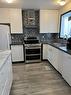 407 7 Avenue, Fox Creek, AB  - Indoor Photo Showing Kitchen With Double Sink 