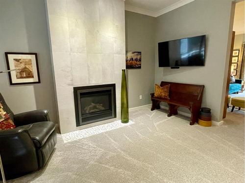 29 Ravine Drive, Whitecourt, AB - Indoor Photo Showing Living Room With Fireplace