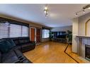 113 Parker Place, Hinton, AB  - Indoor Photo Showing Living Room With Fireplace 