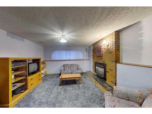 5908 9 Avenue, Edson, AB - Indoor With Fireplace