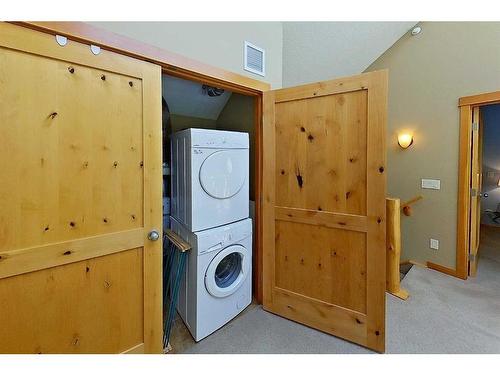 222-107 Armstrong Place, Canmore, AB - Indoor Photo Showing Laundry Room