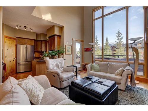 222-107 Armstrong Place, Canmore, AB - Indoor Photo Showing Living Room