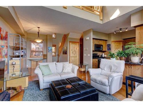 222-107 Armstrong Place, Canmore, AB - Indoor Photo Showing Living Room