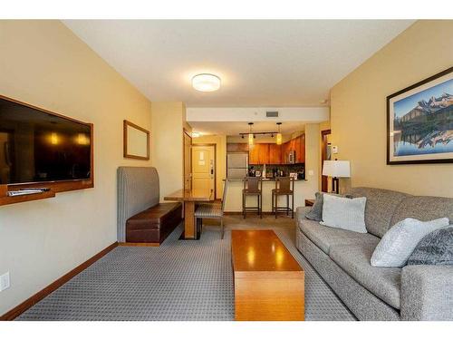 216-190 Kananaskis Way, Canmore, AB - Indoor Photo Showing Living Room