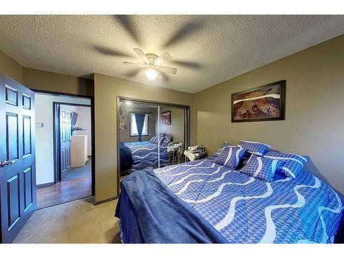 712 3 Avenue, Fox Creek, AB - Indoor Photo Showing Bedroom