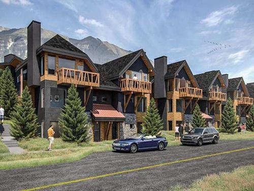 101M-209 Stewart Creek Rise, Canmore, AB - Outdoor With Facade