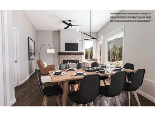 101M-209 Stewart Creek Rise, Canmore, AB - Indoor Photo Showing Dining Room With Fireplace