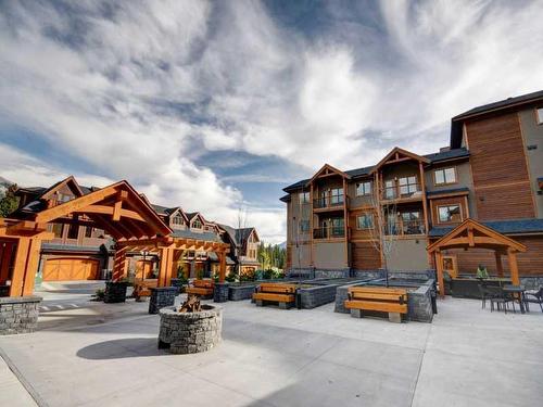 306-808 Spring Creek Drive, Canmore, AB - Outdoor With Facade