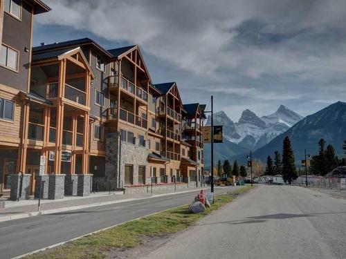 306-808 Spring Creek Drive, Canmore, AB - Outdoor With Facade