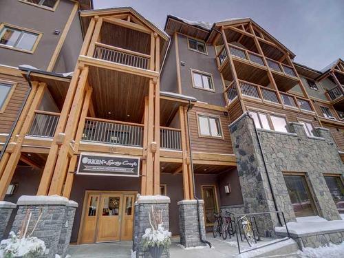 306-808 Spring Creek Drive, Canmore, AB - Outdoor With Facade