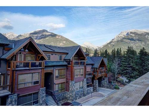 306-808 Spring Creek Drive, Canmore, AB - Outdoor With Facade