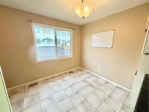 5-110 Tamarack Avenue, Hinton, AB - Indoor Photo Showing Other Room