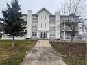 #303-4330A 55 Avenue, Whitecourt, AB  - Outdoor With Facade 