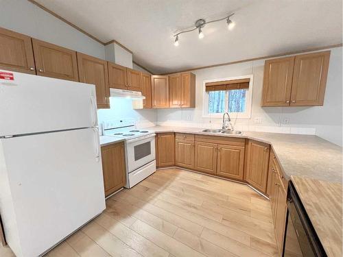 101-660022 Range Road 225.5, Rural Athabasca County, AB - Indoor Photo Showing Kitchen With Double Sink