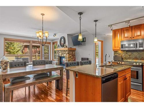 309-701 Benchlands Trail, Canmore, AB - Indoor Photo Showing Kitchen With Double Sink