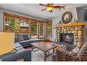 309-701 Benchlands Trail, Canmore, AB  - Indoor Photo Showing Living Room With Fireplace 