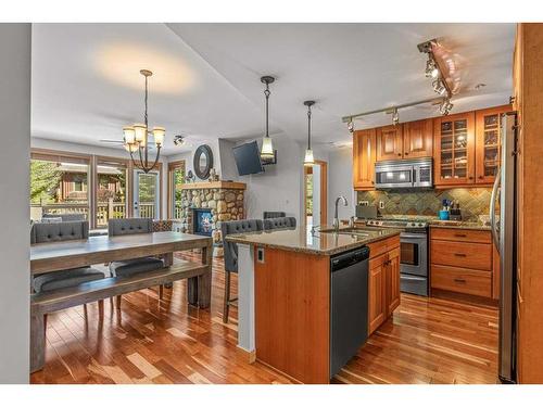 309-701 Benchlands Trail, Canmore, AB - Indoor Photo Showing Kitchen With Double Sink