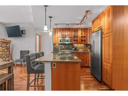 309-701 Benchlands Trail, Canmore, AB - Indoor Photo Showing Kitchen With Double Sink